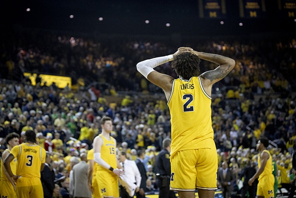 Adrien Nunez (5), Zavier Simpson (3), Jon Teske (15), Isaiah Livers (2), and David DeJulius (0)