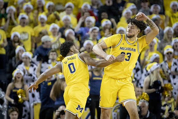 David DeJulius (0) and Brandon Johns Jr. (23)