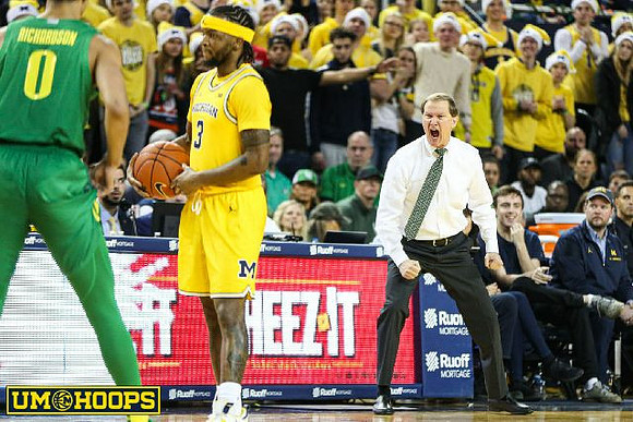 Zavier Simpson (3) and Oregon Head Coach Dana Altman