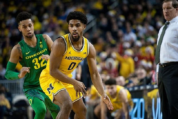 David DeJulius (0) and Oregon Head Coach Dana Altman