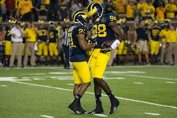 Jeremy Gallon (21) and Devin Gardner (98)