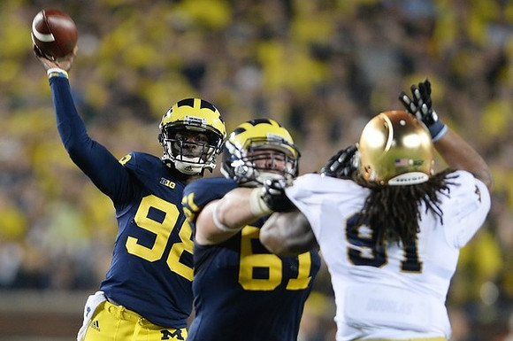 Devin Gardner (98) and Graham Glasgow (61)