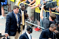 Taylor Lewan (77) and Devin Gardner (98)