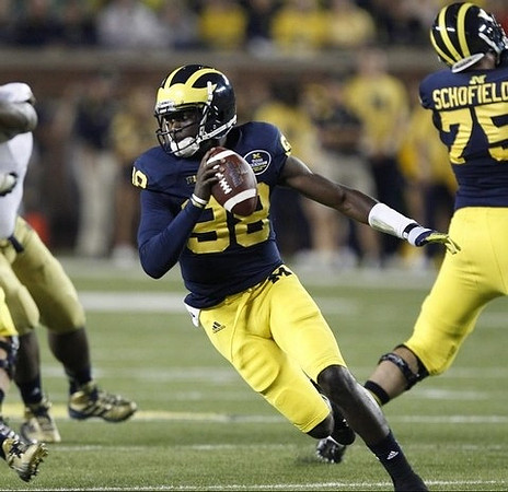 Devin Gardner (98) and Michael Schofield (75)