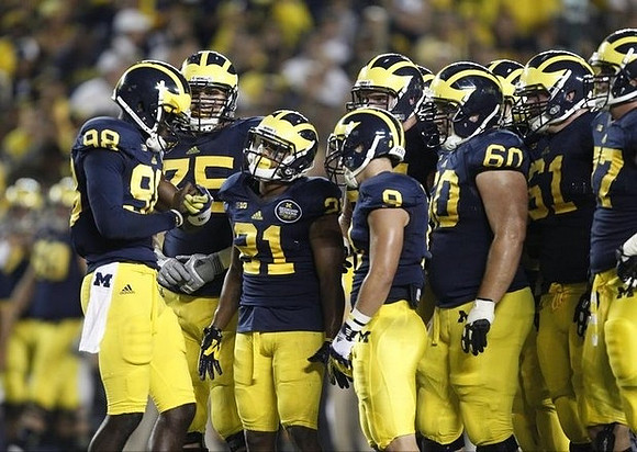 Devin Gardner (98) and Michigan Team