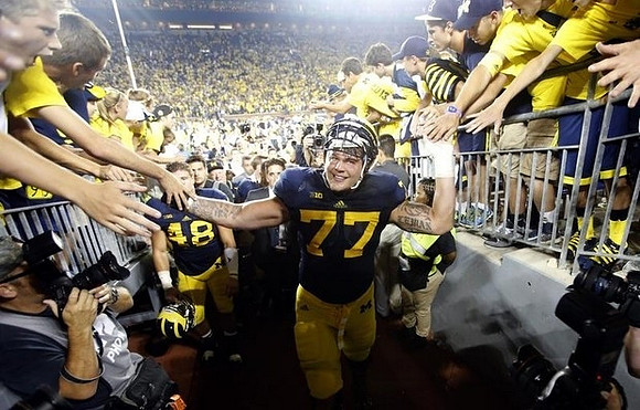 Taylor Lewan (77) and Desmond Morgan (48)