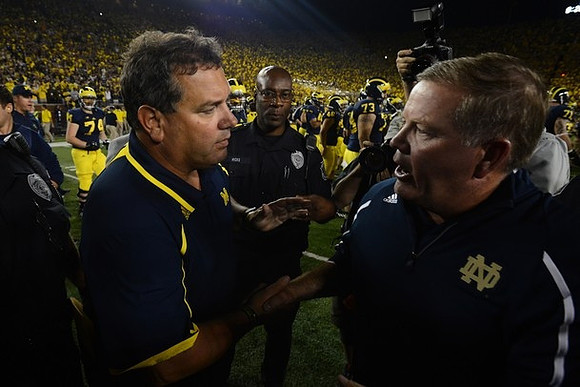 Brady Hoke and Notre Dame Head Coach Brian Kelly