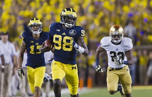 Jeremy Jackson (17) and Devin Gardner (98)