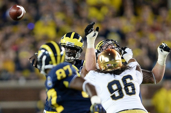 Devin Funchess (87) and Devin Gardner (98)