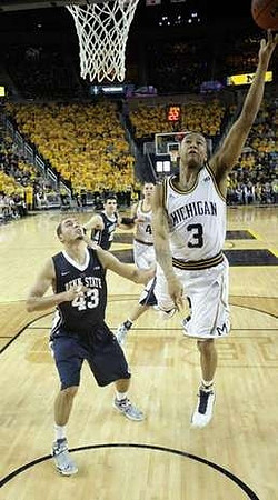 Trey Burke (3) and Mitch McGary (4)