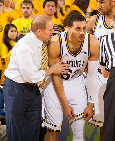 John Beilein, Jordan Morgan (52), and Jon Horford (15)