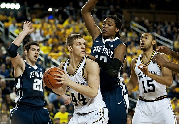 Max Bielfeldt (44) and Jon Horford (15)