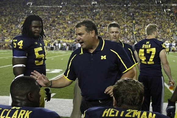 Frank Clark (57), Richard Ash (54), Brady Hoke, Keith Heitzman (92), and Jake Ryan (47)