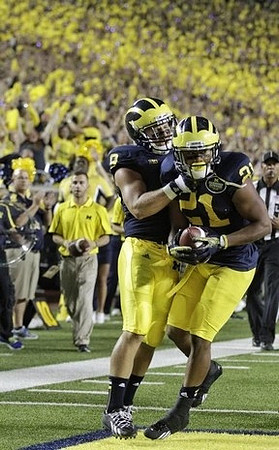 Drew Dileo (9) and Jeremy Gallon (21)