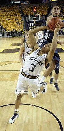 Trey Burke (3), Mitch McGary (4), and Nik Stauskas (11)