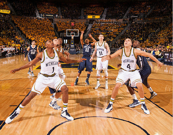 Glenn Robinson III (1), Nik Stauskas (11), and Mitch McGary (4)