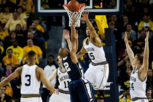 Trey Burke (3), Nik Stauskas (11), Jon Horford (15), and Max Bielfeldt (44)
