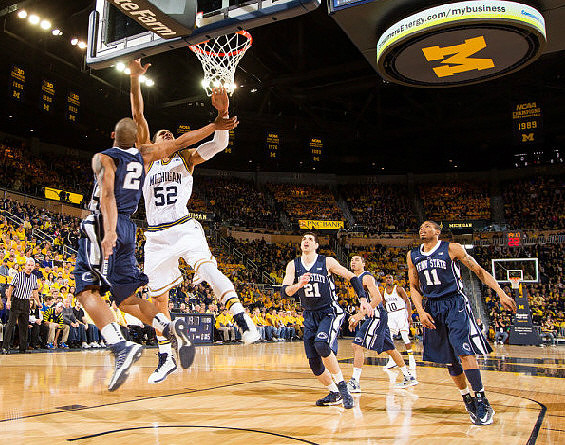 Jordan Morgan (52) and Tim Hardaway Jr. (10)