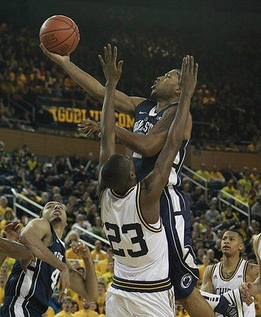 Caris LeVert (23) and Trey Burke (3)