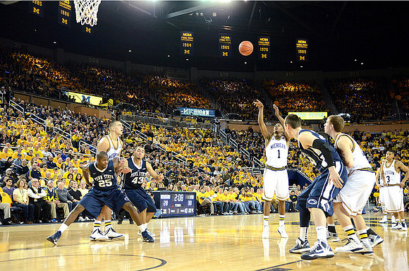 Mitch McGary (4), Glenn Robinson III (1), Spike Albrecht (2), and Trey Burke (3)