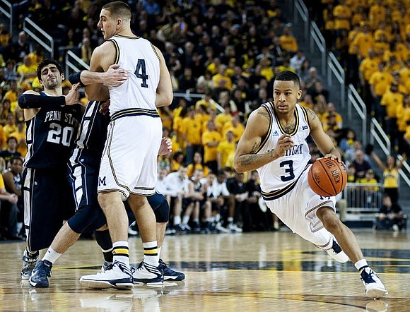 Mitch McGary (4) and Trey Burke (3)