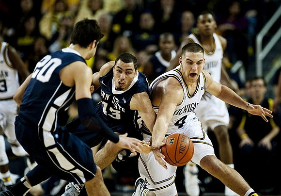 Mitch McGary (4) and Glenn Robinson III (1)
