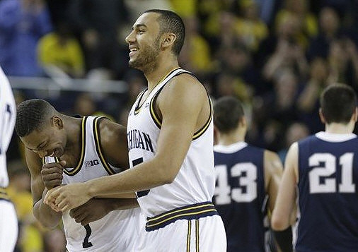 Glenn Robinson III (1) and Jon Horford (15)