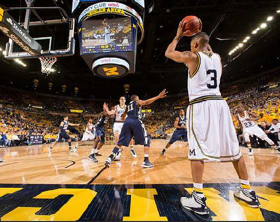 Trey Burke (3), Glenn Robinson III (1), Mitch McGary (4), and Caris LeVert (23)