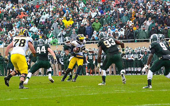 Erik Magnuson (78) and Devin Gardner (98)