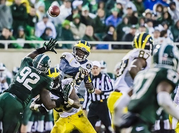 Devin Gardner (98), Fitzgerald Toussaint (28), and Devin Funchess (87)