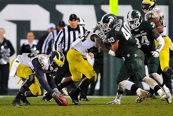 Devin Gardner (98), Fitzgerald Toussaint (28), and Devin Funchess (87)