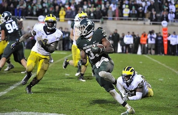 Cameron Gordon (4) and Frank Clark (57)