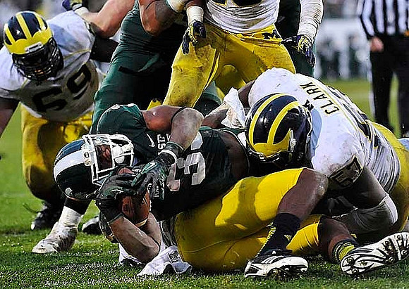 Willie Henry (69) and Frank Clark (57)