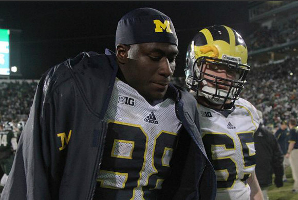 Devin Gardner (98) and Kyle Bosch (65)
