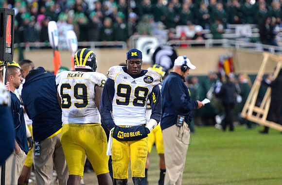 Willie Henry (69), Devin Gardner (98), and Greg Mattison