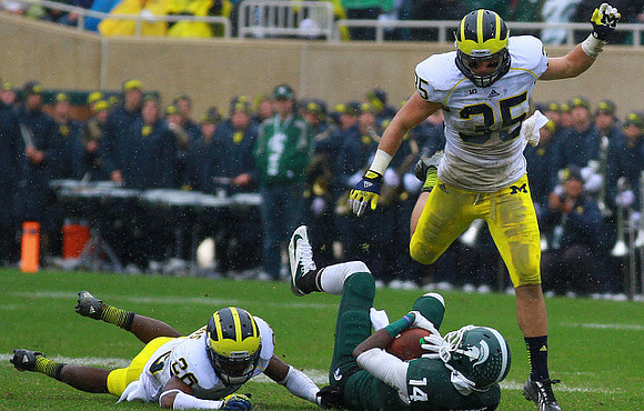 Jourdan Lewis (26) and Joe Bolden (35)