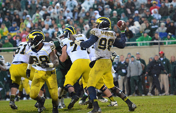 Graham Glasgow (61), Fitzgerald Toussaint (28), Erik Magnuson (78), and Devin Gardner (98)