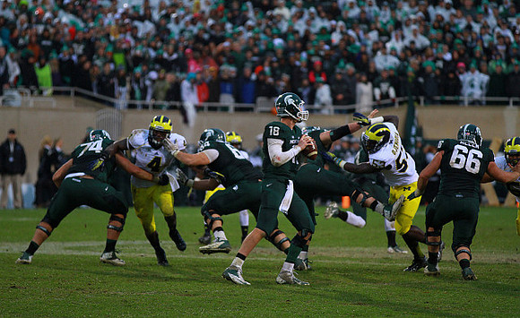 Cameron Gordon (4) and Mario Ojemudia (53)