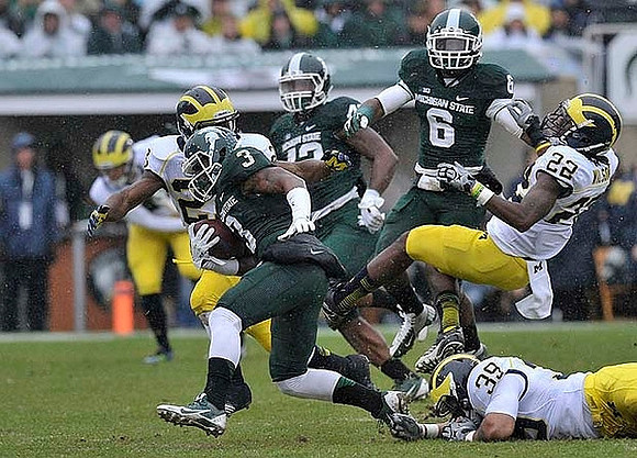 Dennis Norfleet (23), Jarrod Wilson (22), and Sione Houma (39)