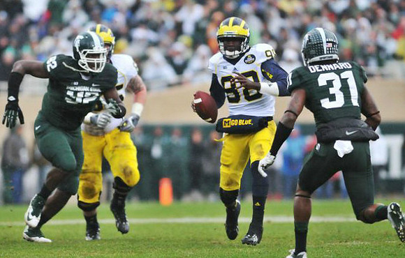 Kyle Bosch (65) and Devin Gardner (98)