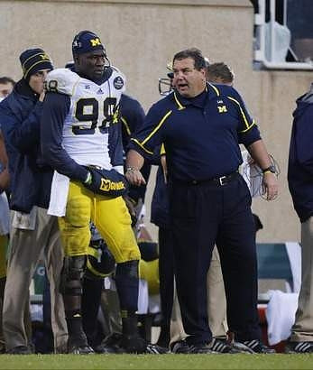 Devin Gardner (98) and Brady Hoke