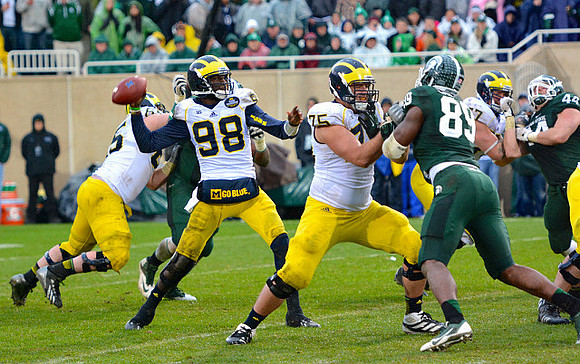 Kyle Bosch (65), Devin Gardner (98), Michael Schofield (75), and Taylor Lewan (77)