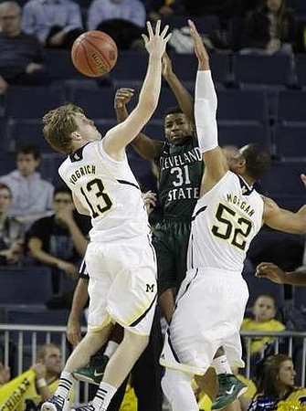 Matt Vogrich (13) and Jordan Morgan (52)
