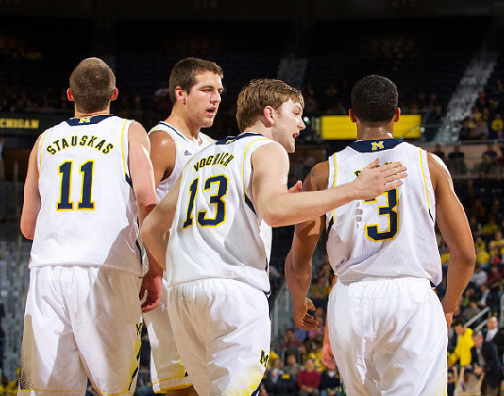 Nik Stauskas (11), Mitch McGary (4), Matt Vogrich (13), and Trey Burke (3)