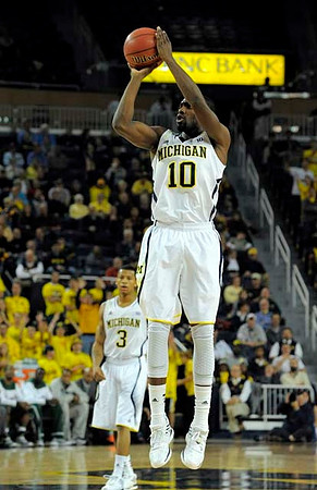 Tim Hardaway Jr. (10) and Trey Burke (3)