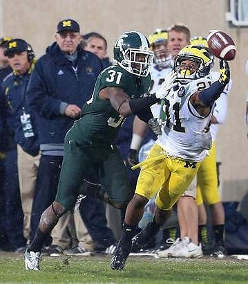 Jeremy Gallon (21) and Jon Falk