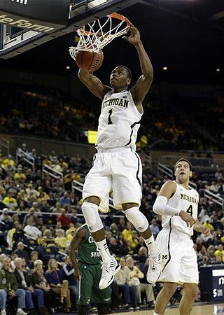 Glenn Robinson III (1) and Mitch McGary (4)