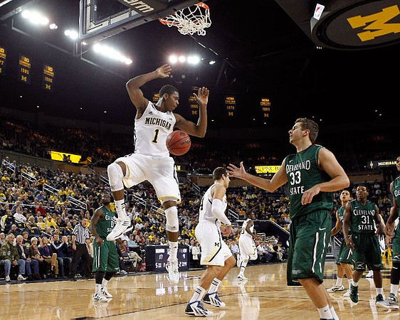 Glenn Robinson III (1) and Mitch McGary (4)