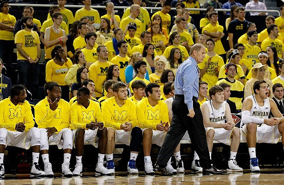 Corey Person (32), Eso Akunne (5), Caris LeVert (23), Max Bielfeldt (44), Josh Bartelstein (20), John Beilein, Matt Vogrich (13), and Mitch McGary (4)
