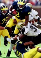 Chris Howard (8), Jeff Backus (79), and Tai Streets (86)